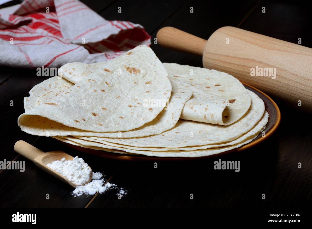 Tortillas on plate and rolling pin, wrap, wraps, mexican, mexican Stock