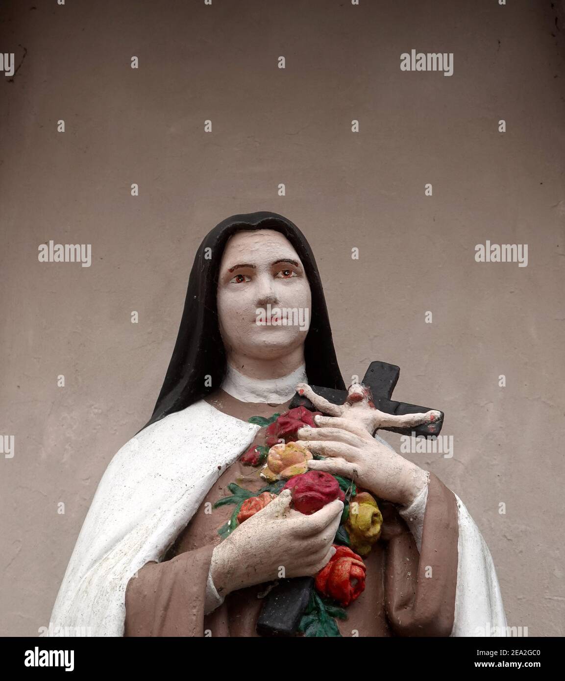 A statue of St Therese of Lisieux outside the Church Of The