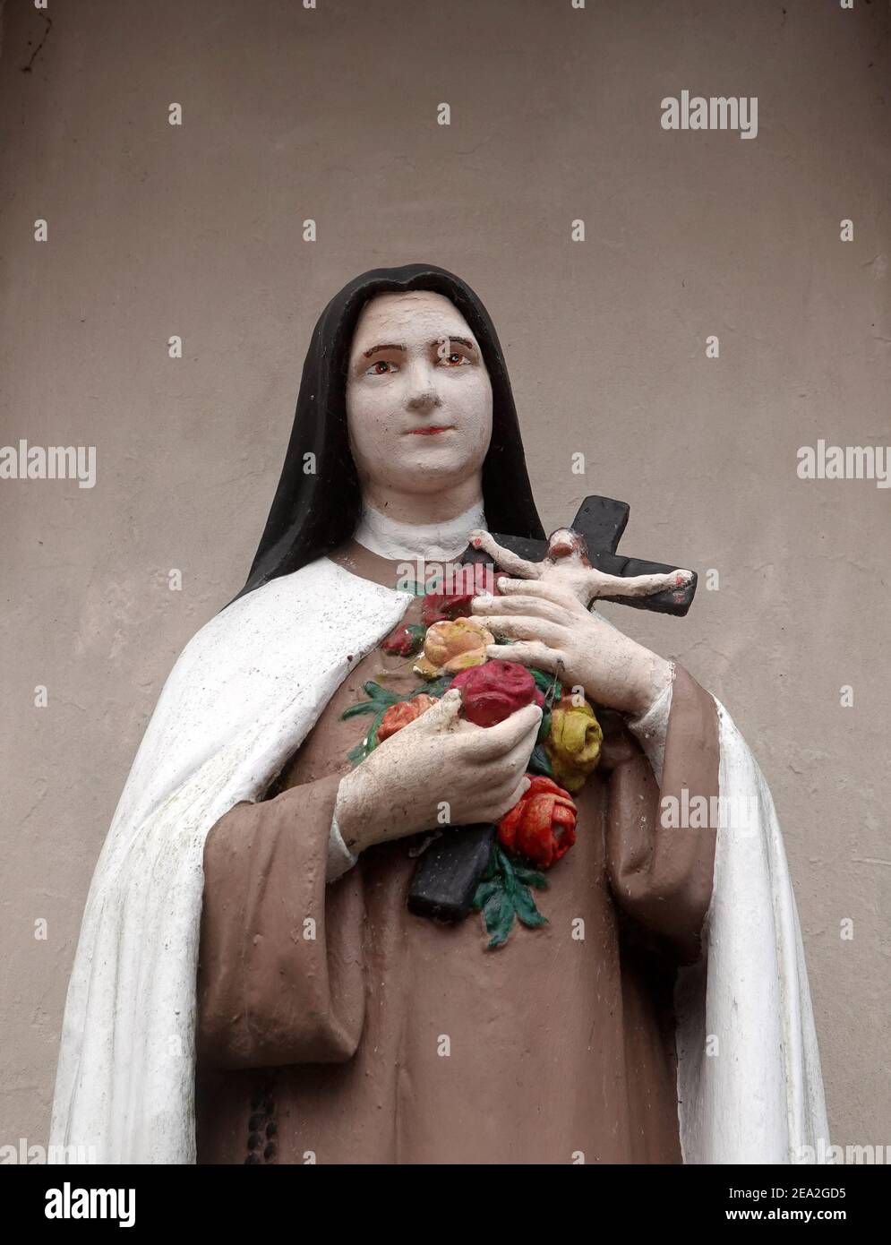 A statue of St Therese of Lisieux outside the Church Of The ...