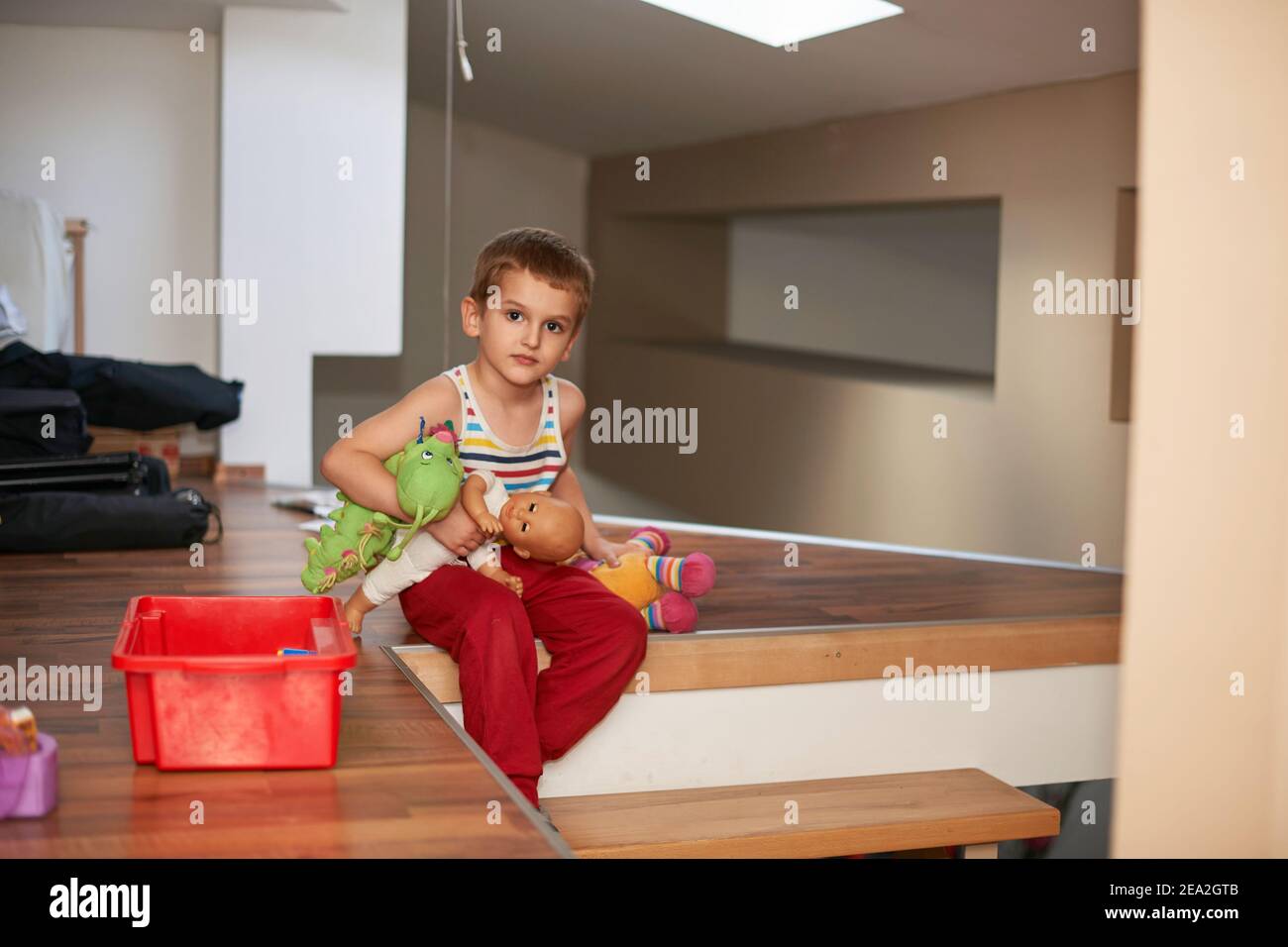 Little boy child playing with creative toys Stock Photo - Alamy