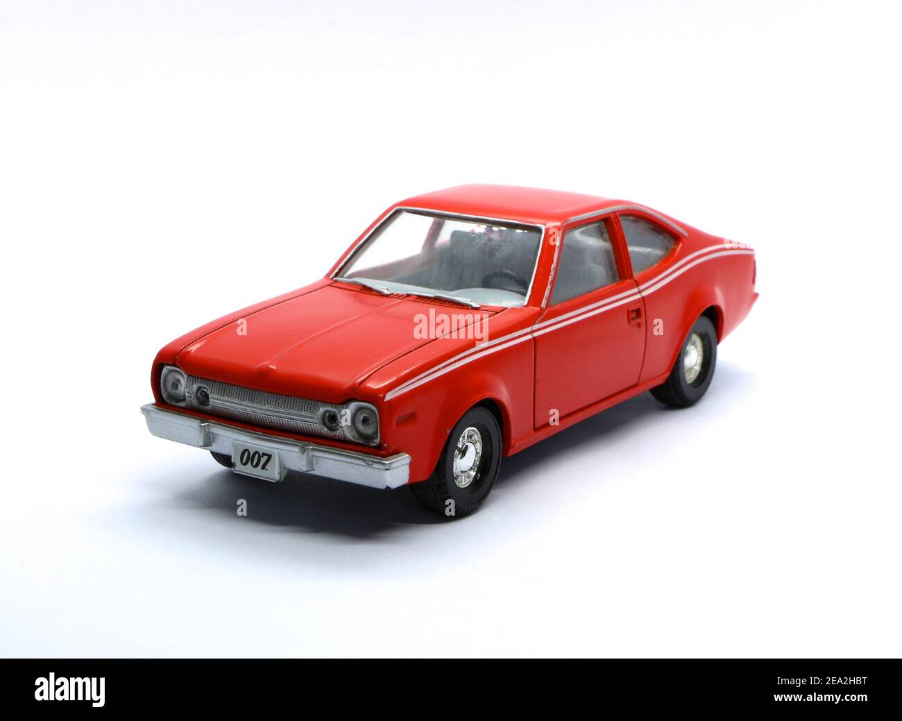Photo of a Red AMC Hornet Corgi die cast model from the Roger Moore James Bond 007 film Man with the Golden Gun 1974 front three quarters view Stock Photo