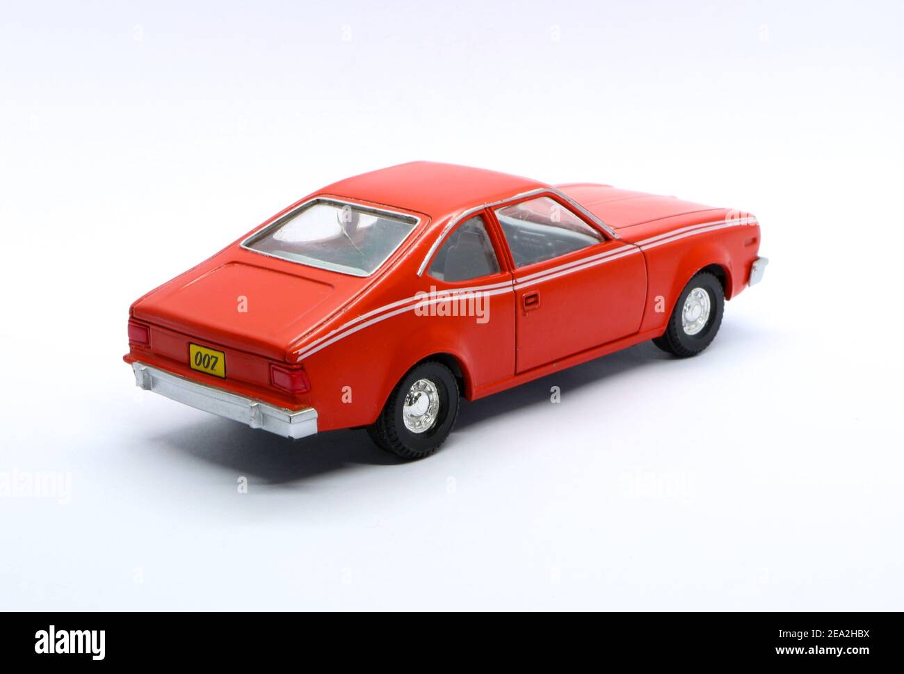 Photo of a Red AMC Hornet Corgi die cast model from the Roger Moore James Bond 007 film Man with the Golden Gun 1974 rear three quarters view Stock Photo