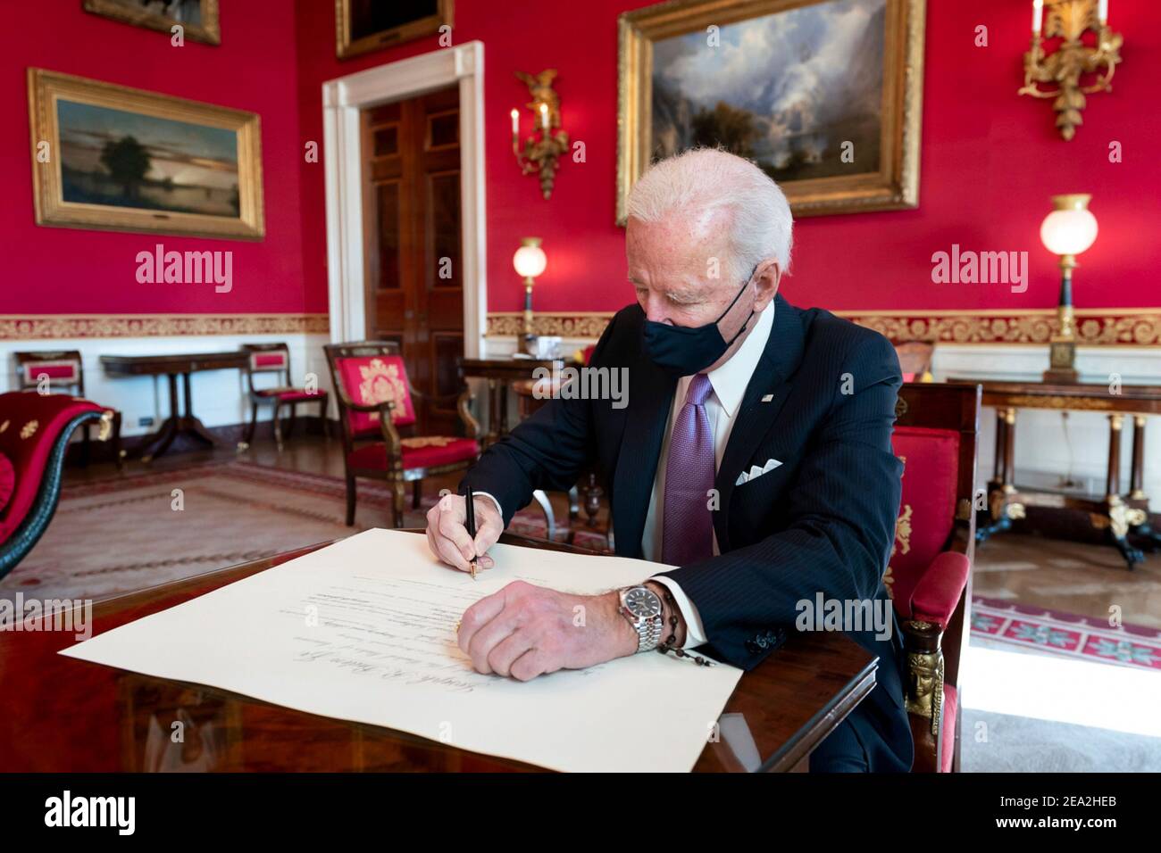 U.S President Joe Biden signs the commission for Avril Haines to be the Director of National Intelligence in the Red Room of the White House January 21, 2021 in Washington, D.C. Stock Photo