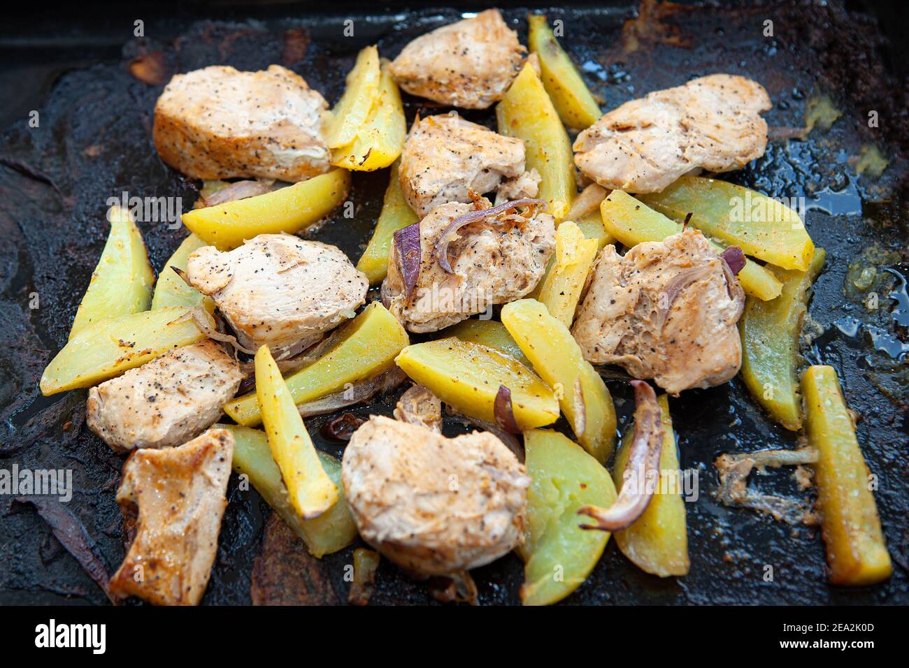 Grilled potato with meat . High calorie food Stock Photo Alamy