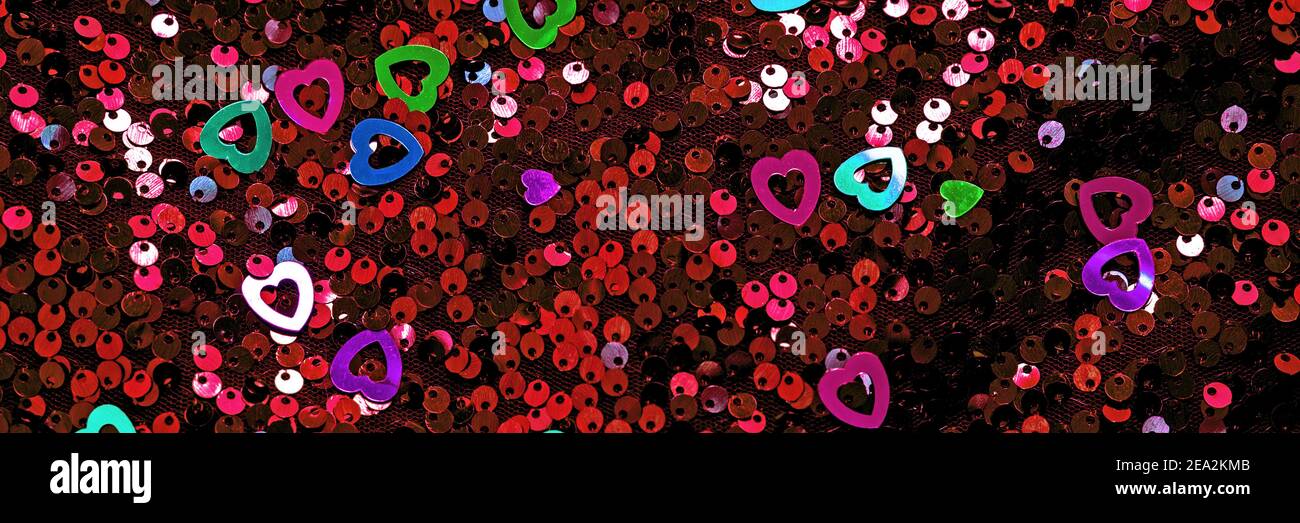 Colourful hearts decor on glitter texture Stock Photo