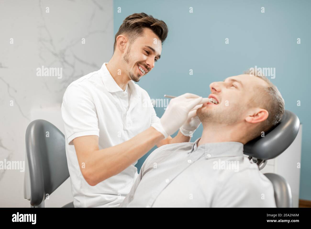 Dentist and patient during an orthodontic treatment Stock Photo Alamy