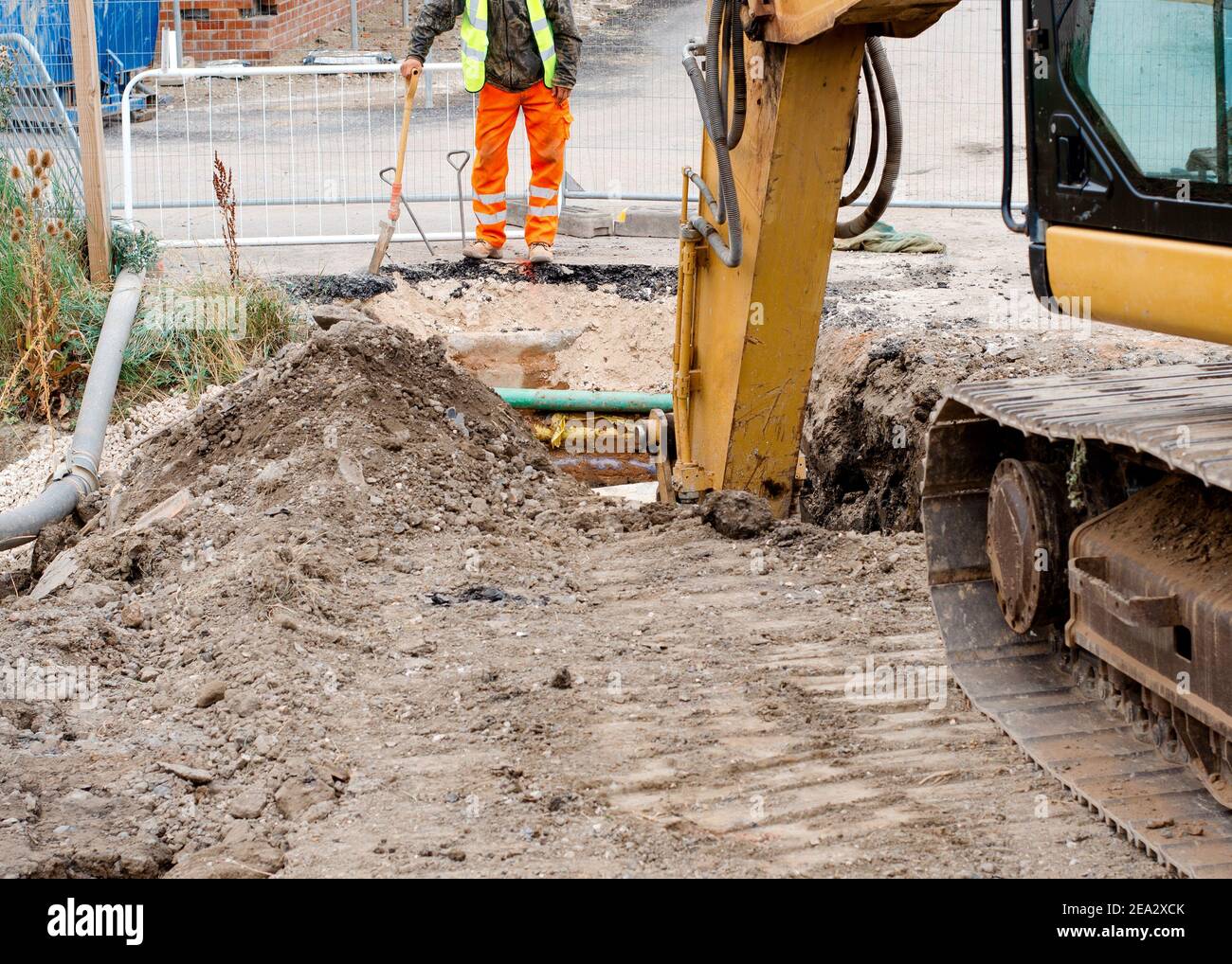 Groundworker is installing internal drainage for a house Stock Photo Alamy