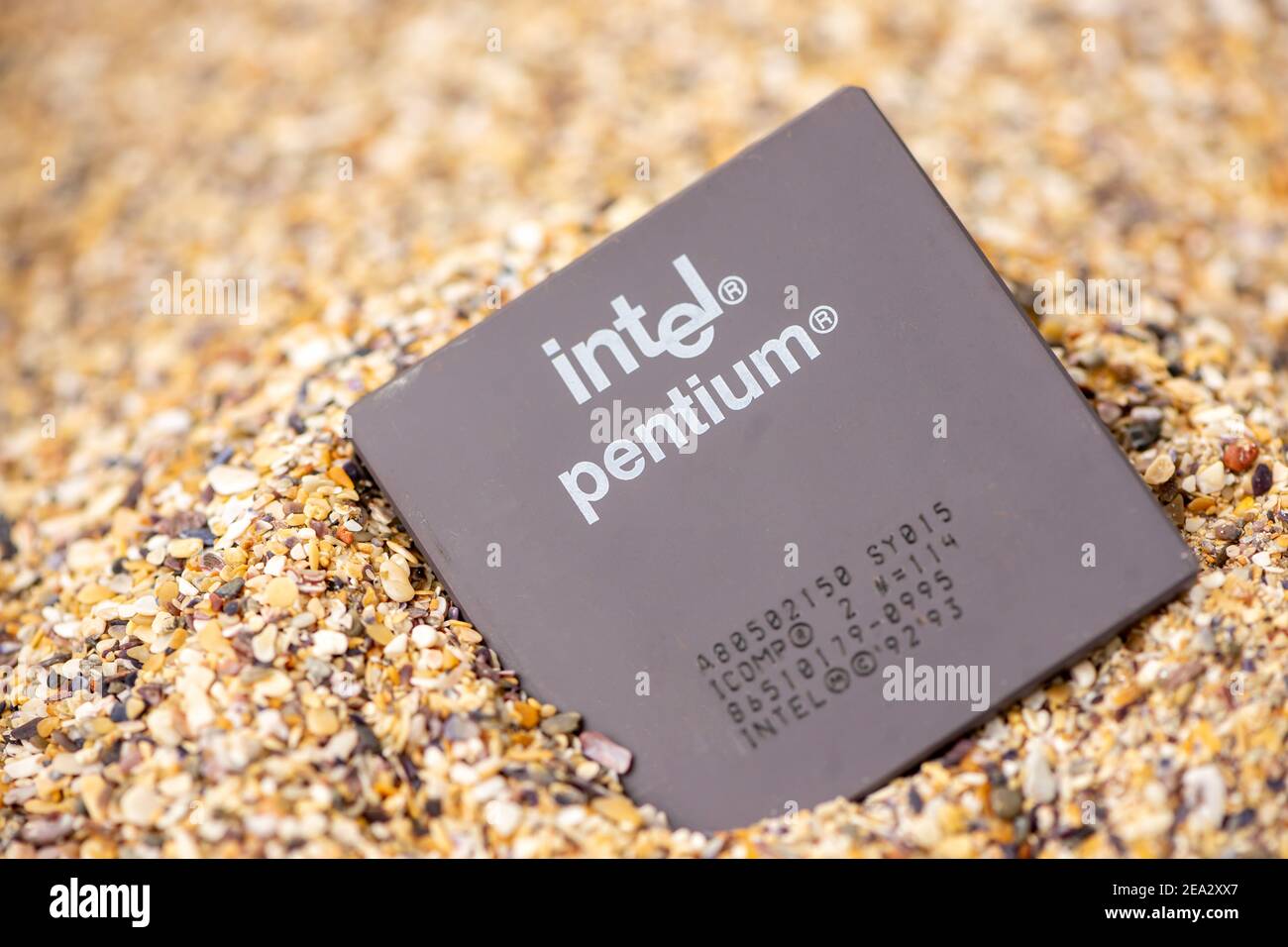 Timisoara, Romania - October 17, 2020: Close-up of an Intel Pentium A80502150 processor, 150 Mhz, socket 7 with sand in the background. Stock Photo