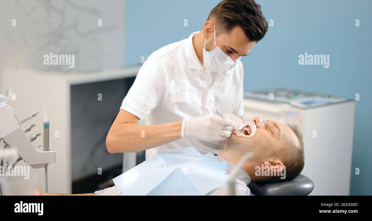 Dentist and patient during an orthodontic treatment Stock Photo Alamy