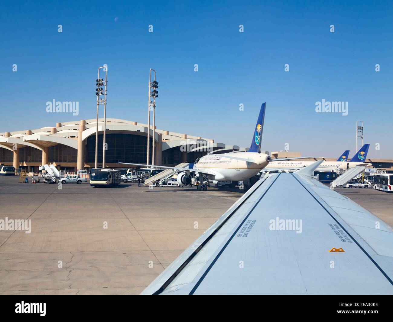 Riyadh - March 01: Planes preparing for take off at Riyadh King Khalid  Airport on March 01, 2016 in Riyadh, Saudi Arabia. Riyadh airport is home  port Stock Photo - Alamy