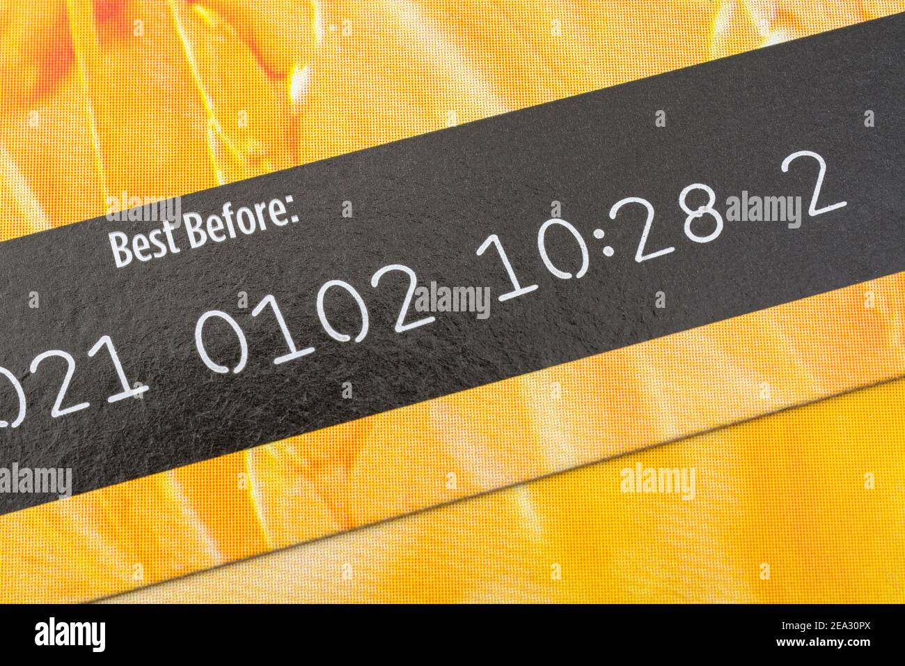 Closeup shot of food Best Before Date / BBD on cardboard box of ASDA