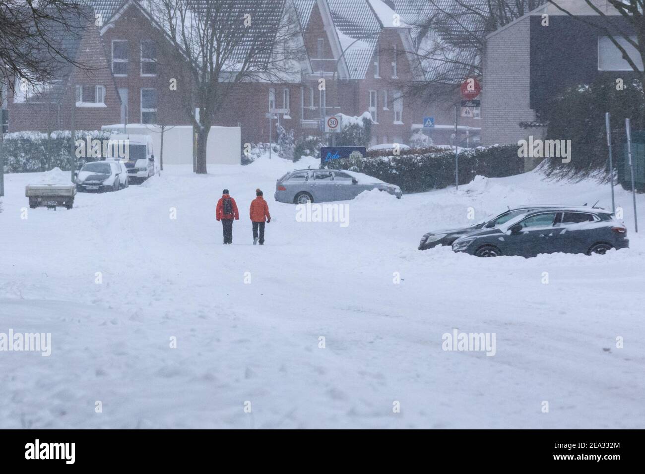 Haltern, NRW, Germany. 07th Feb, 2021. People in the village of Sythen near Haltern make the most of the circa 30 cms of fresh snow. A severe weather warning is in place for parts of North Rhine-Westphalia and other areas after snow storms brought traffic chaos and problems with public transport. It is set to continue snowing, with temperatures well below zero for the next few days. Credit: Imageplotter/Alamy Live News Stock Photo