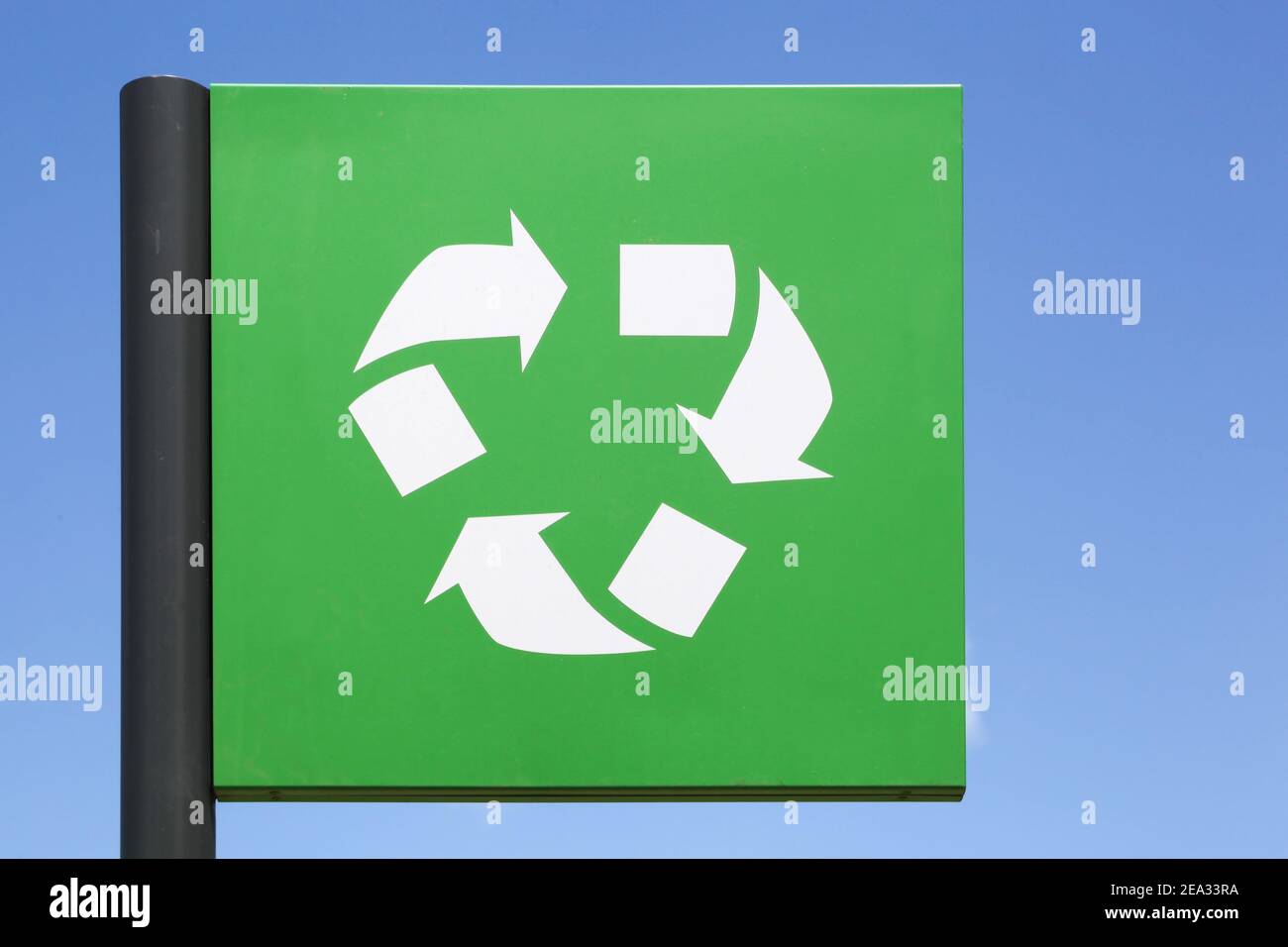 Recycling sign on a pole Stock Photo