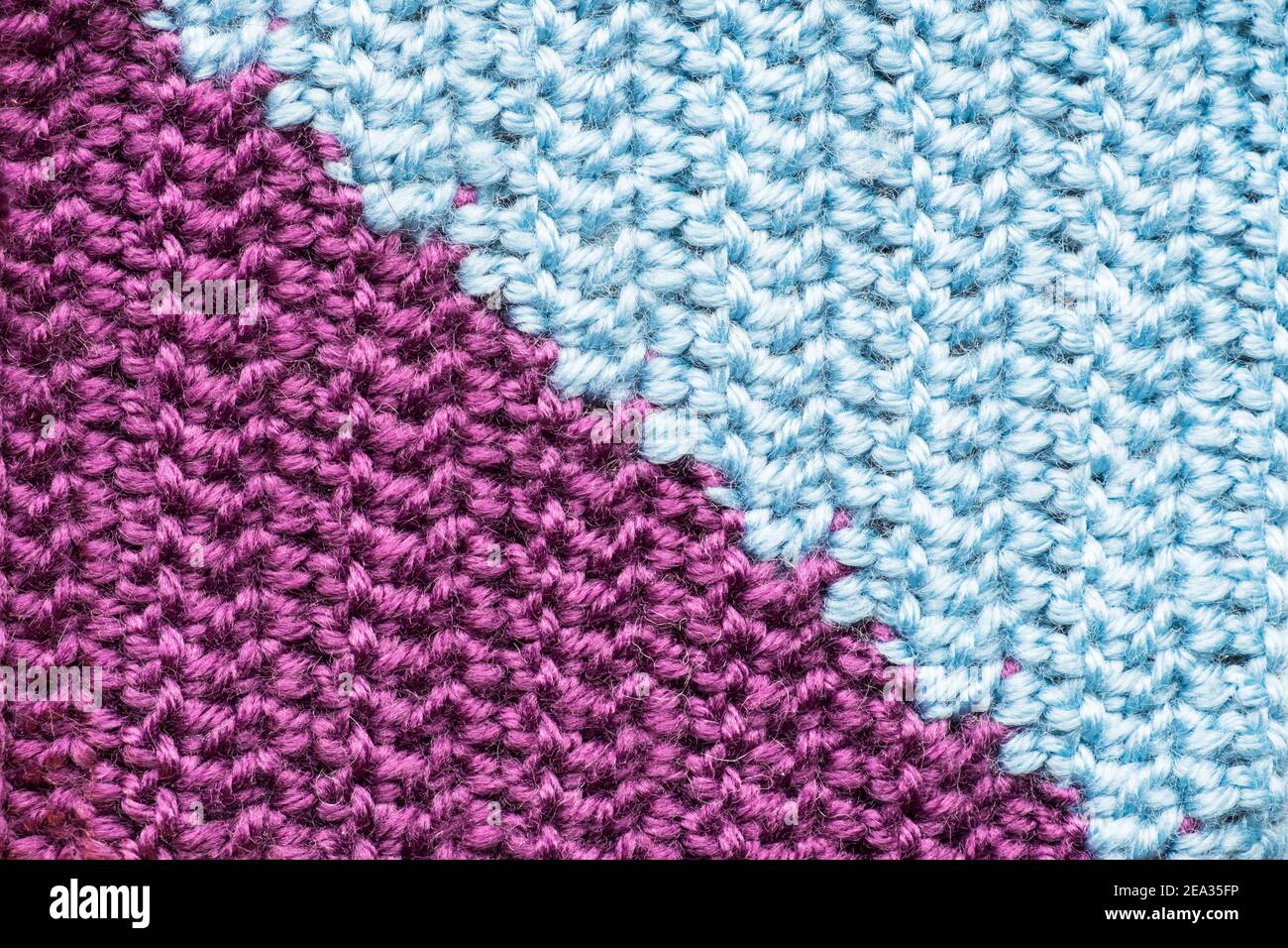 Handmade close-up simple lilac and blue crochet pattern Stock Photo