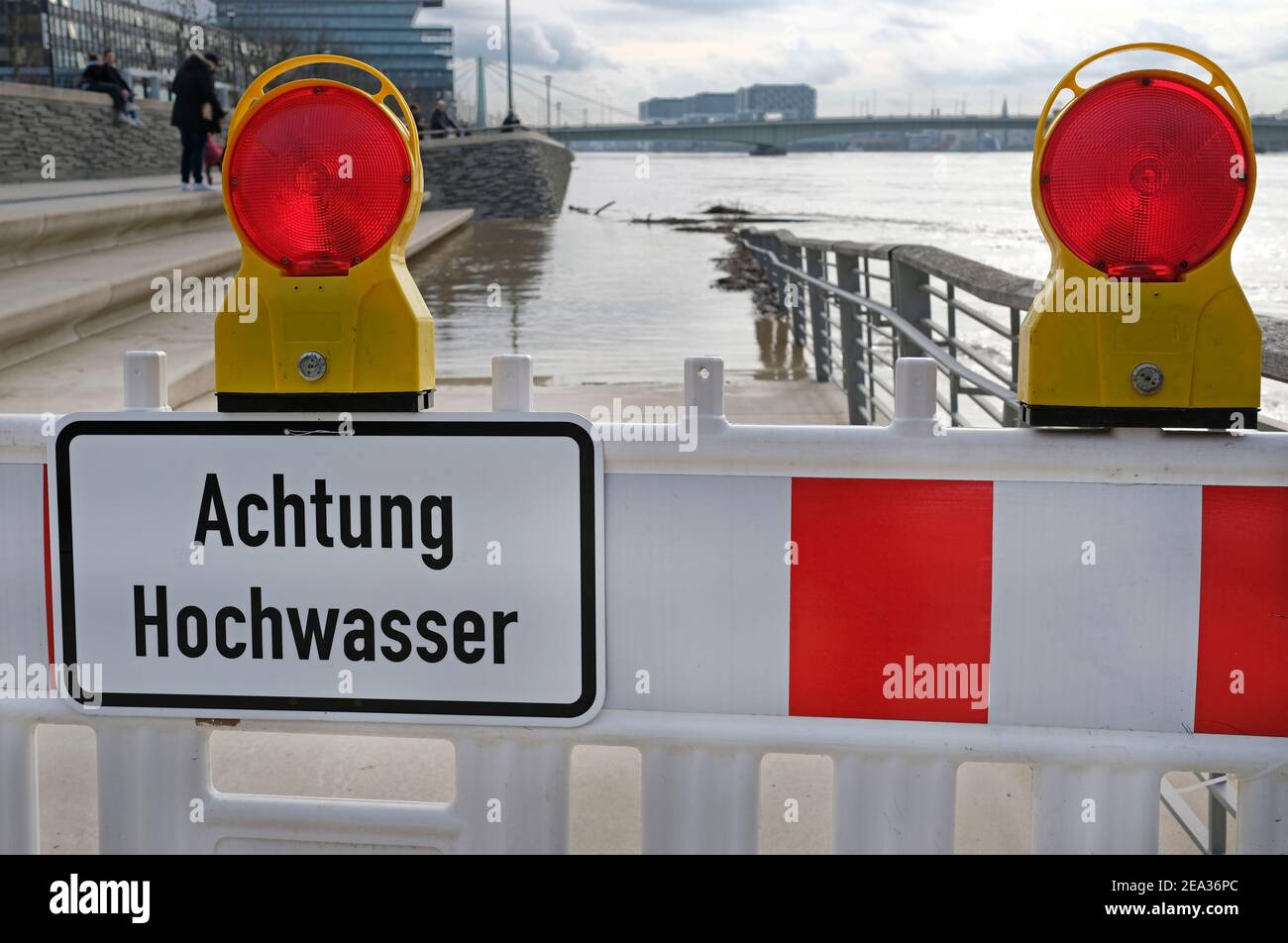 Extreme weather: Warning sign in German at the entrance to a flooded pedestrian zone in Cologne, Germany Stock Photo