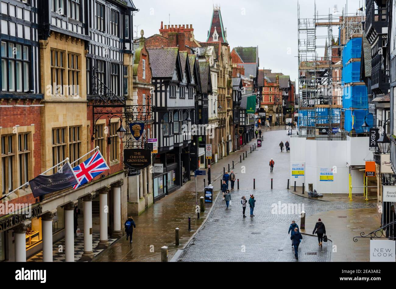 Chester; UK: Jan 29, 2021: A general view in the shopping district of Chester seen on a January Friday afternoon. Most people are staying at home duri Stock Photo