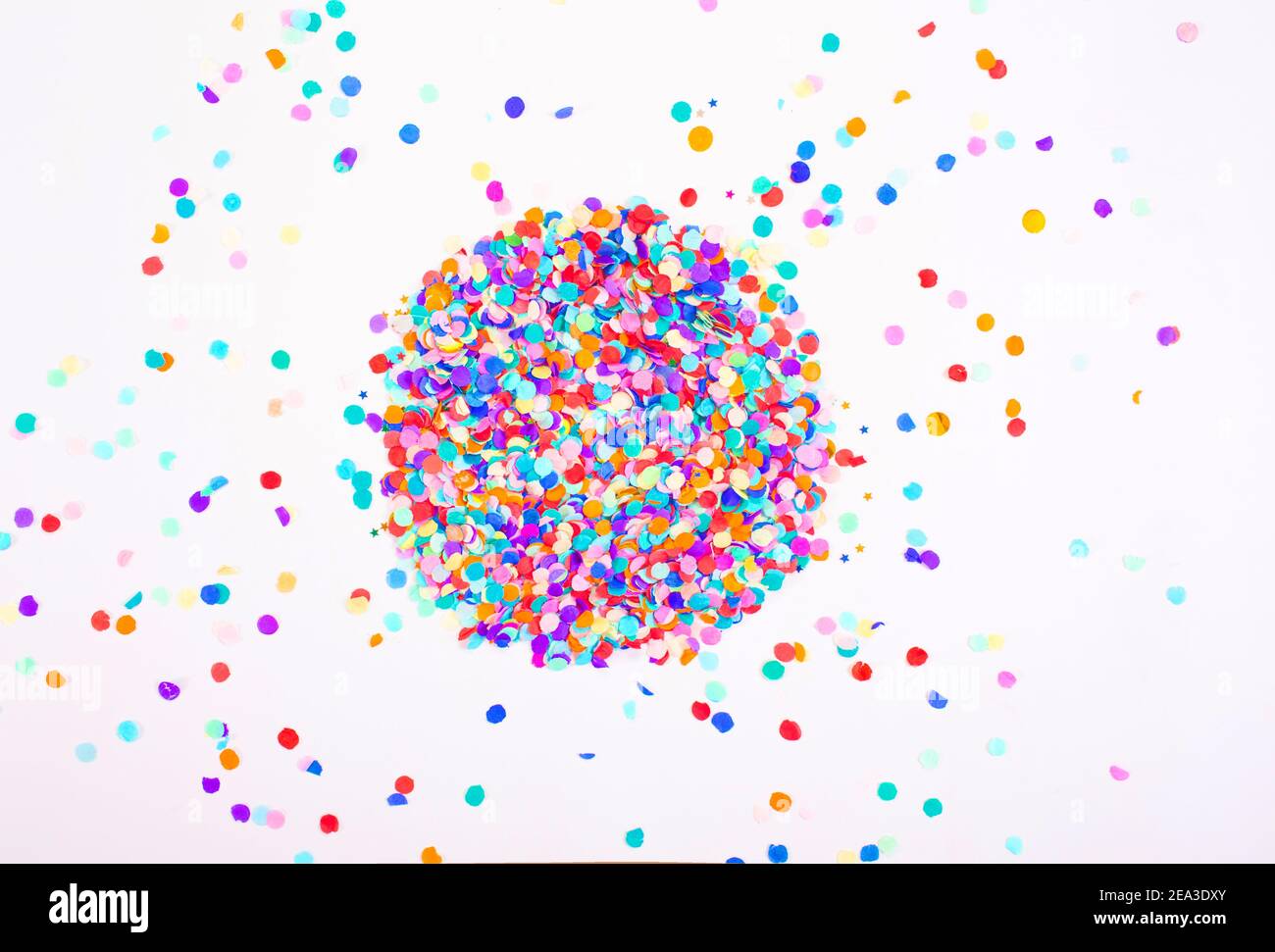 colorful confetti on a white background. Top view. Stock Photo