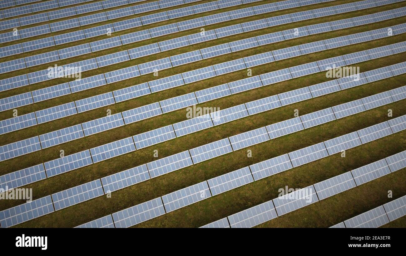 a close-up aerial view of solar panels (pv cells) on a solar farm in germany Stock Photo