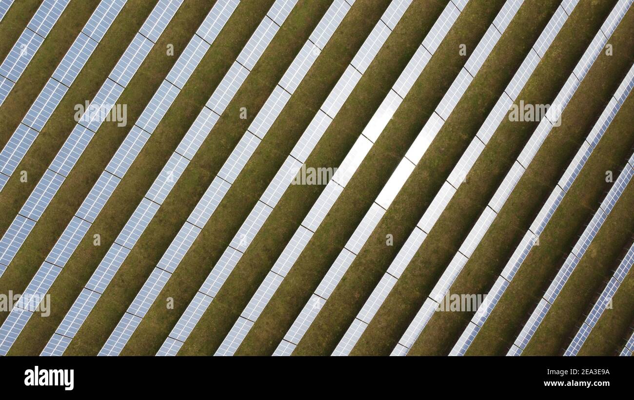 a close-up aerial view of solar panels (pv cells) on a solar farm in germany Stock Photo