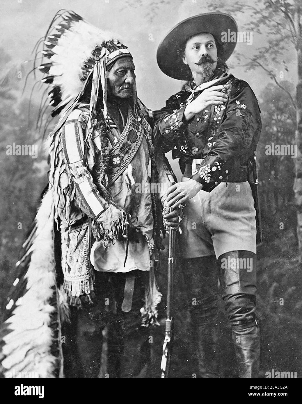 BUFFALO BILL (1846-1917) American showman at right with Sitting Bull in 1885 when he had joined the travelling  Wild West show. Stock Photo
