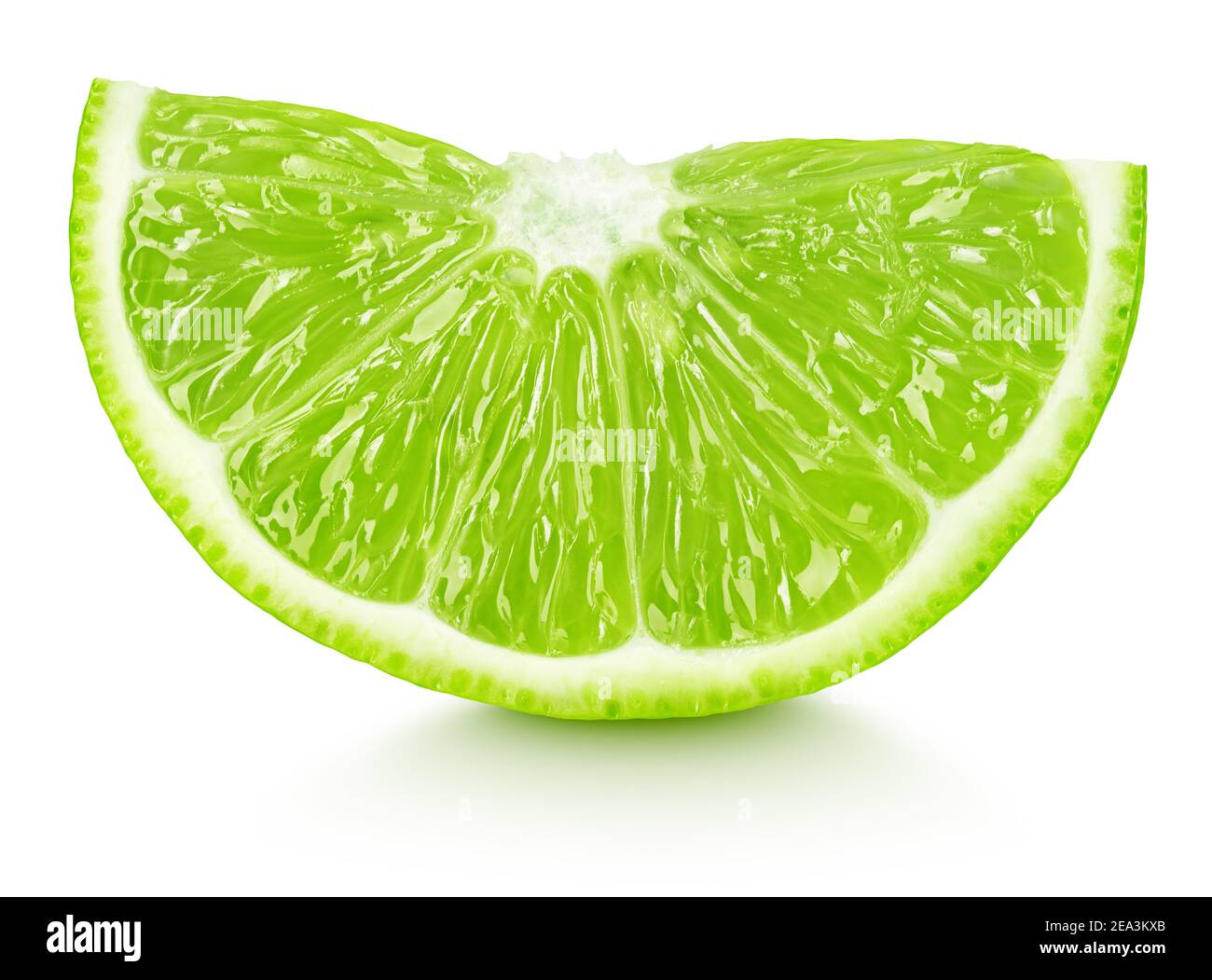 Ripe slice of green lime citrus fruit isolated on white background Stock Photo