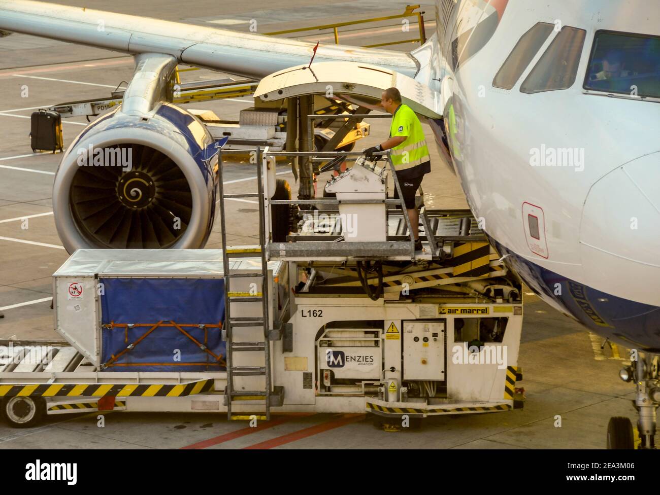 Prague, Czech Republic - August 2018: Air freight pallet being loaded into the front cargo hold of a British Airways Airbus A320 jet Stock Photo