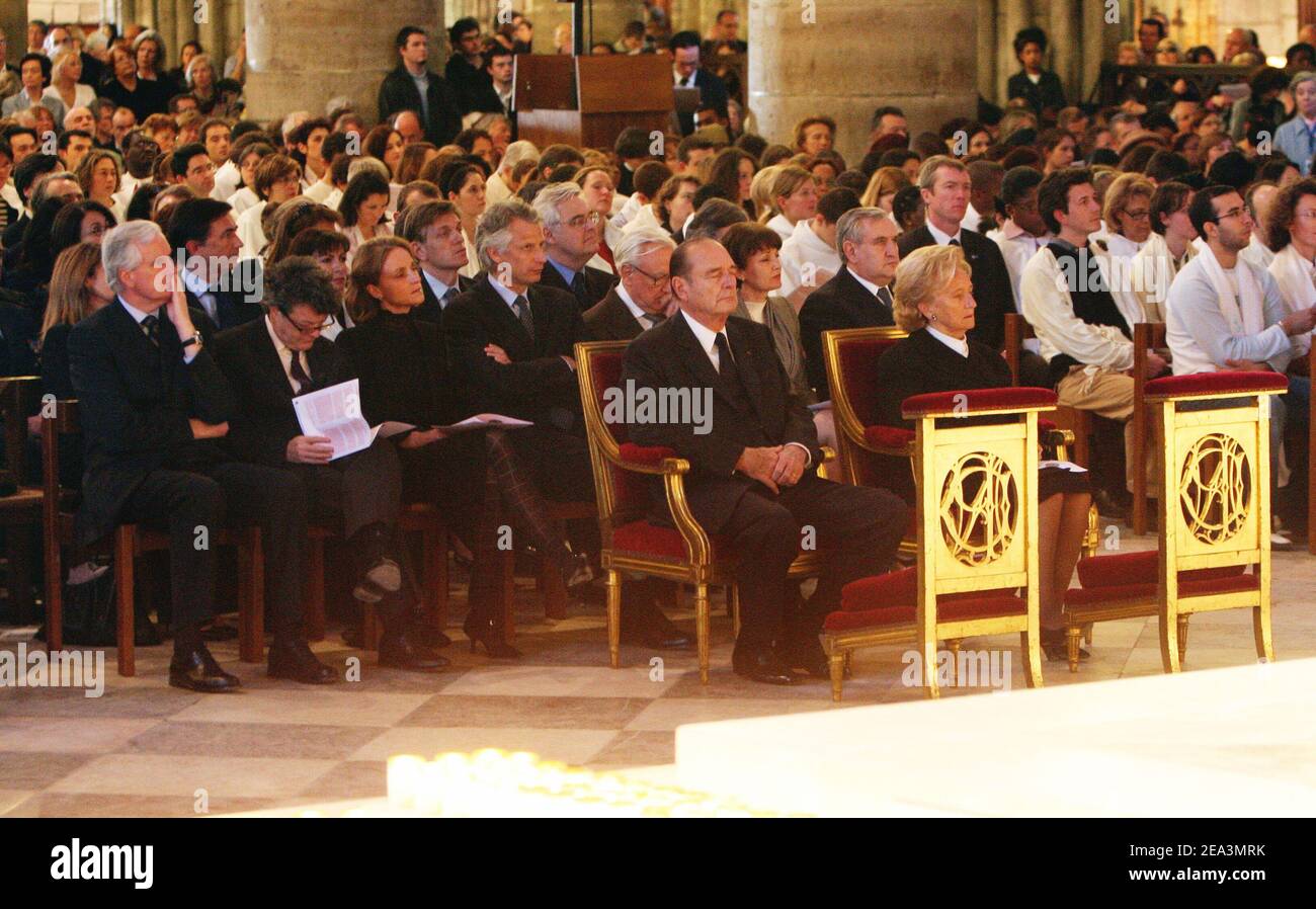 French President Jacques Chirac and his wife Bernadette, Prime Minister Jean-Pierre Raffarin and members of the government attend a special mass celebrated for Pope John Paul II by Monsignor Andre Vingt-Trois, Archbishop of Paris, at Notre-Dame in Paris, France, on April 3, 2005. Photo by Mousse/ABACA. Stock Photo