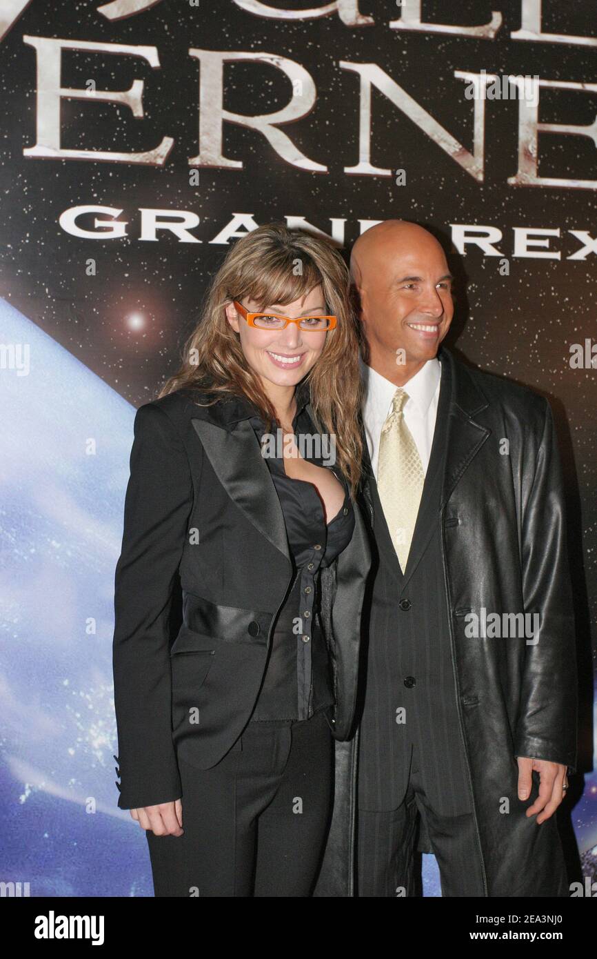 US Actress Erica Durance ('Smallville') with her husband David Palffy pose when they arrive at the opening of the 13th 'Jules Verne Film Festival' held at the 'Grand Rex' cinema in Paris, France on April 6, 2005. The 2005 festival's edition commemorates the 100th anniversary of French author Jules Verne's death. Photo by Benoit Pinguet/ABACA. Stock Photo