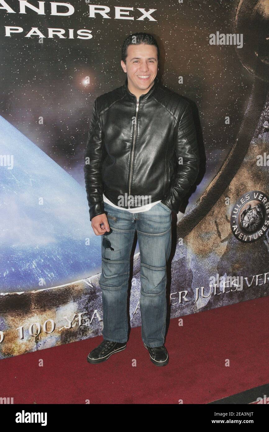 French Ra singer Faudel poses when he arrives at the opening of the 13th 'Jules Verne Film Festival' held at the 'Grand Rex' cinema in Paris, France on April 6, 2005. The 2005 festival's edition commemorates the 100th anniversary of French author Jules Verne's death. Photo by Benoit Pinguet/ABACA. Stock Photo