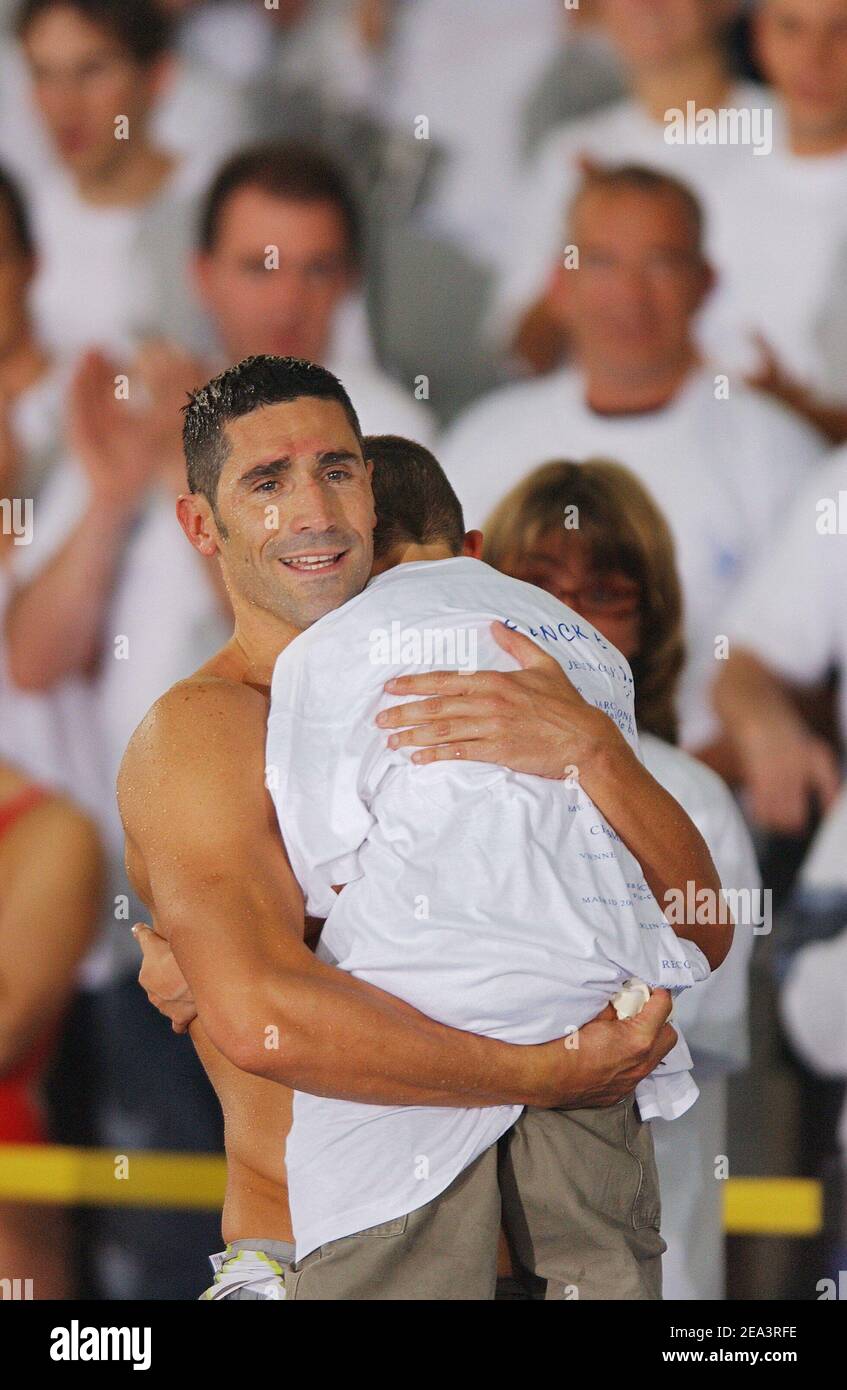 Last official competition of the french swimmer Franck Esposito (200 m butterfly men) with his son Louca during the French swimming championships, in Nancy, on April 13, 2005. Photo by Nicolas Gouhier/Cameleon/ABACA. Stock Photo