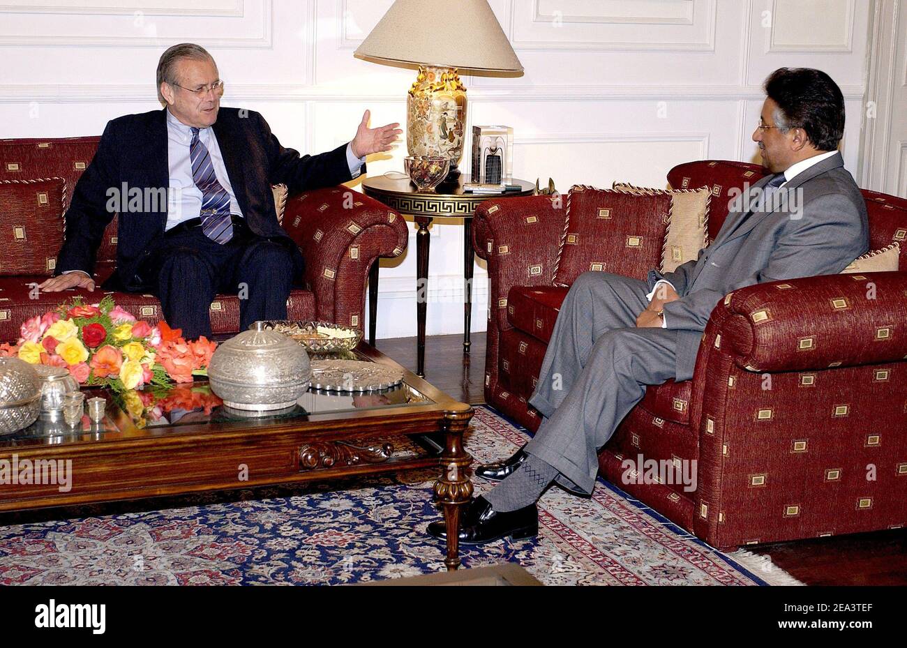 Secretary of Defense Donald H. Rumsfeld meets to discuss the global war on terrorism with Pakistan's President Gen. Pervez Musharraf at the presidential retreat in Islamabad, Pakistan, on April 13, 2005. Rumsfeld is in Pakistan to meet with key government officials. DoD photo by Tech. Sgt. Cherie A. Thurlby, U.S. Air Force. Photo by DOD/ABACA. Stock Photo