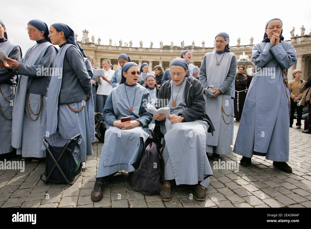 Nuns gather to pray, waiting for the white smoke indicating that the  College of Cardinals have elected a new Pope, in Vatican City on April 19,  2005. Cardinals under the age of