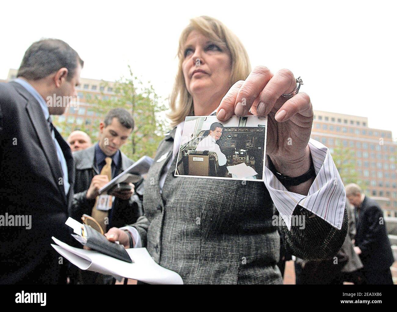 Debra Burlingane shows a picture of husband Charles , pilot of flight 77 , who died on September attacks accused Sept. 11 after the verdict of conspirator Zacarias Moussaoui who appears in court and pleads guilty to charges related to the 9/11 attacks in Alexandria, Virginia on April 22 2005. Moussaoui, a 36 year-old French citizen of Moroccan descent, has been charged with six counts of conspiracy in relation to the Sept. 11, 2001 hijackings that killed nearly 3,000 people. He is charged with conspiring with al Qaeda in the attacks. Four of the conspiracy counts against Moussaoui, carry the d Stock Photo