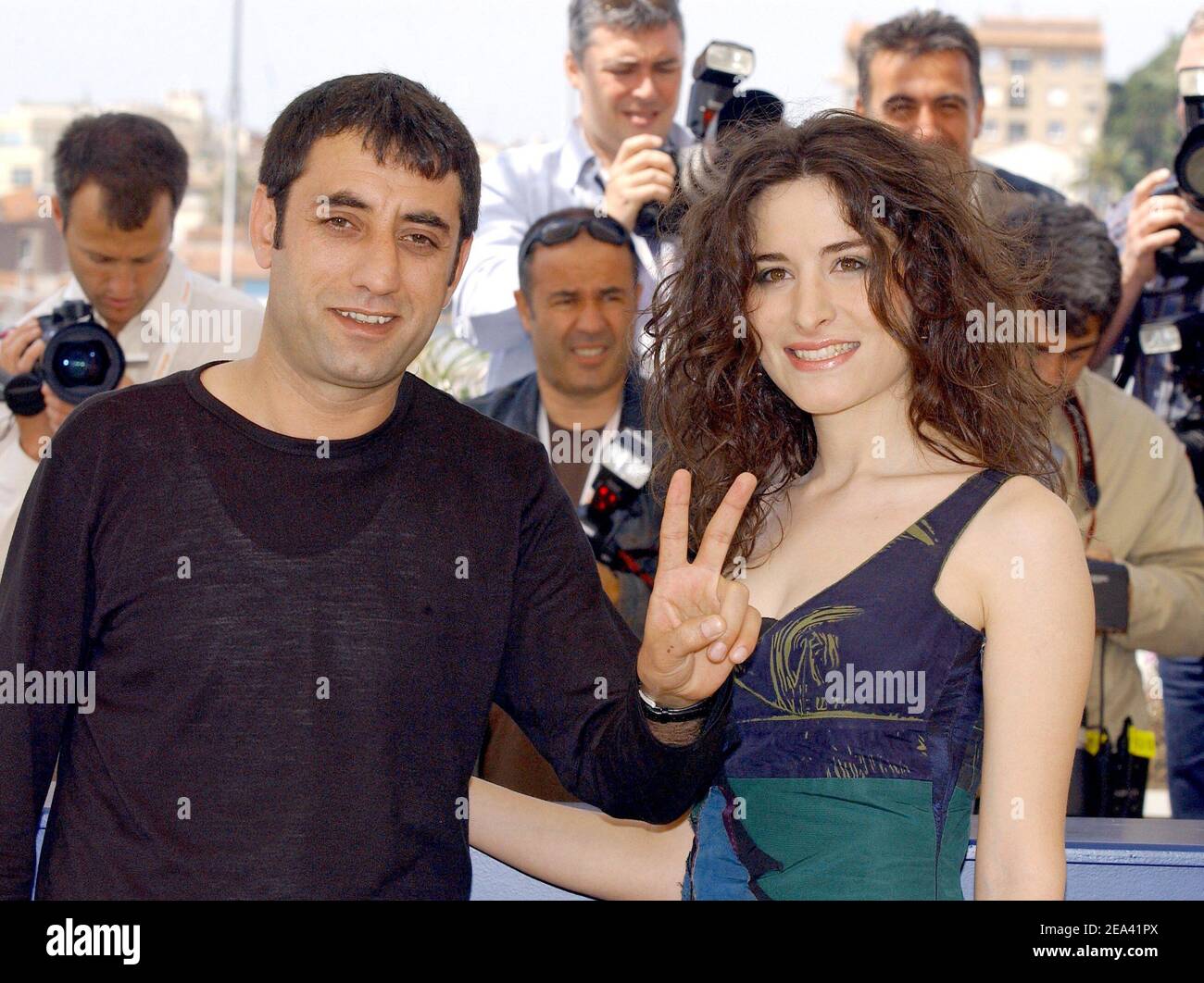 Turkish actors (r) Belcim Bilgin and Nazmi Kirik pose during a photocall for Iraqi-born director Hiner Saleem's film 'Kilometre Zero' at the 58th Cannes Film Festival, May 12, 2005. Photo by Hahn-Nebinger-Klein/ABACA Stock Photo