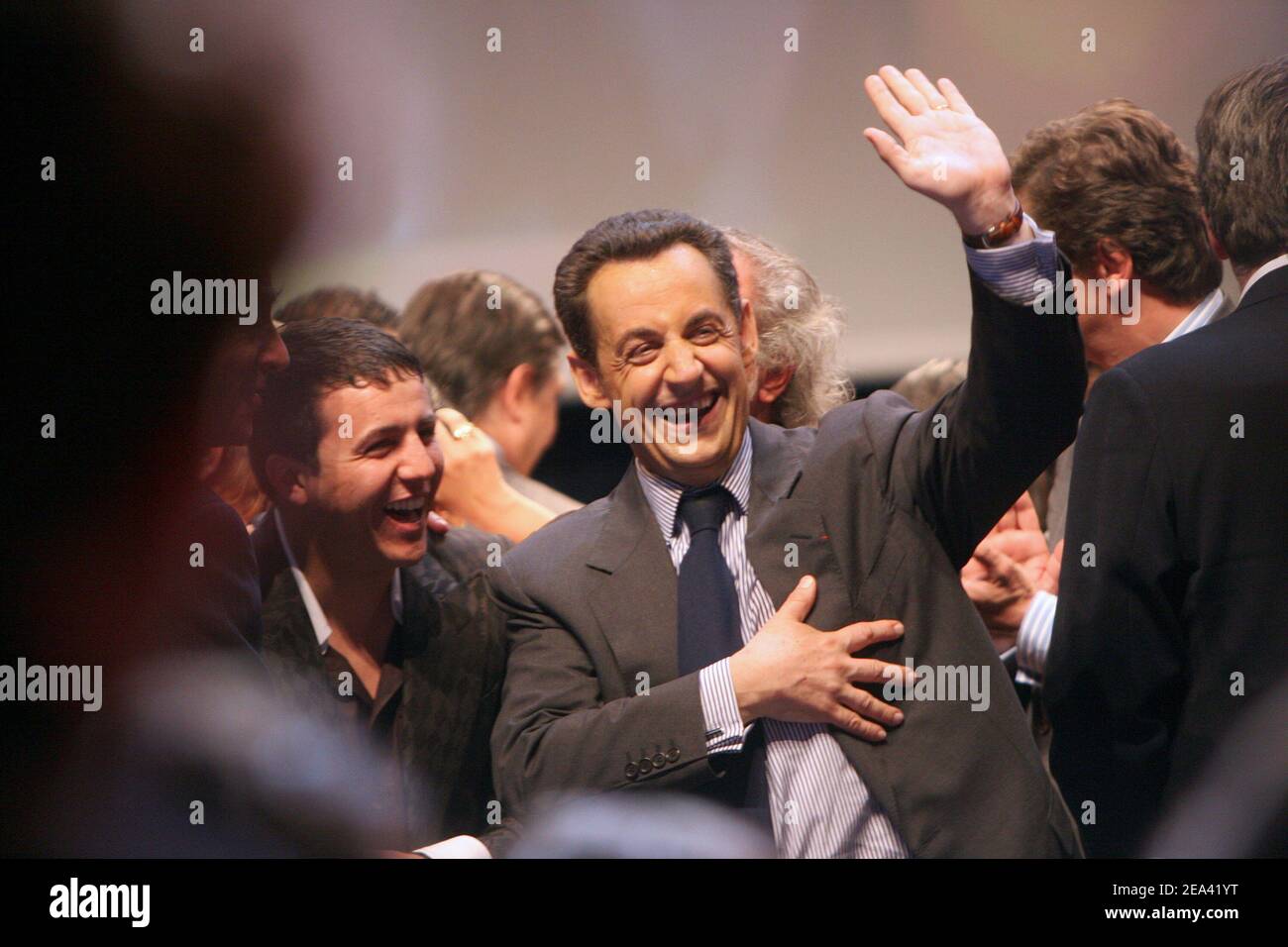 French singer Faudel and Governing UMP party president Nicolas Sarkozy attend a meeting of UMP party for the 'Yes' vote for the upcoming European Constitution referendum vote next May 29, at the Palais des Sports, in Paris, France, on May 12, 2005. Photo by Mousse/ABACA. Stock Photo