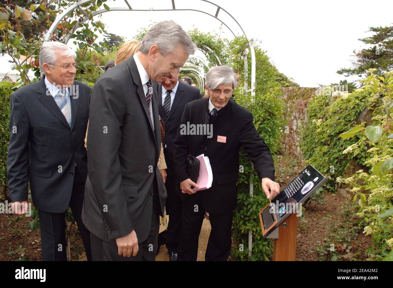 LVMH CEO, Bernard Arnault visits the garden with General auctioneer of the  exposure, Jean-Luc Dufresne at the the Christian Dior's house and museum in  Granville, Britain coast of France on May 14