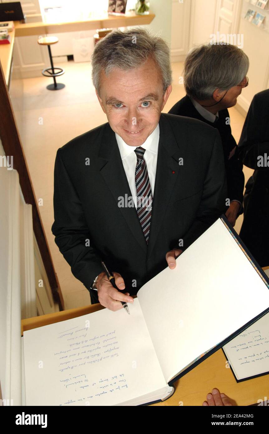 LVMH CEO, Bernard Arnault signs the Gold Book for the opening of Christian  Dior's house and museum in Granville, Britain coast of France on May 14,  2005 for the celebration of the