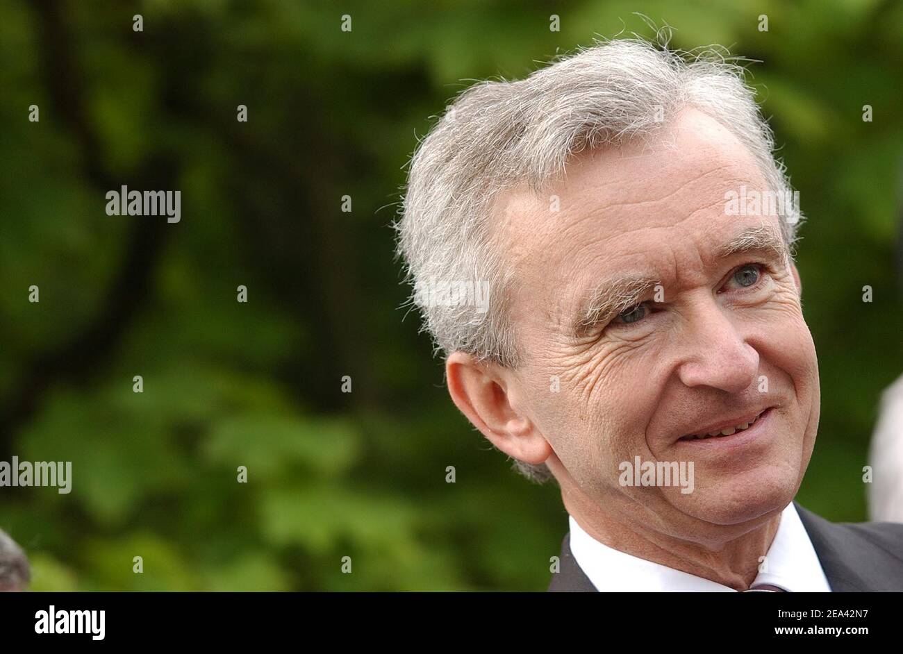 LVMH CEO, Bernard Arnault visits the garden with General auctioneer of the  exposure, Jean-Luc Dufresne at the the Christian Dior's house and museum in  Granville, Britain coast of France on May 14
