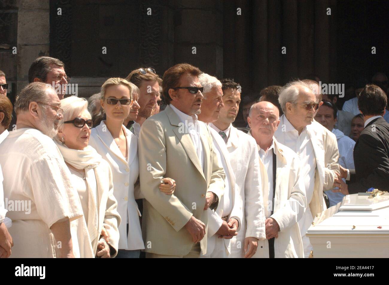 Carlos, Line Renaud, Johnny and wife Laeticia, Stephane Collaro and Michel Legrand at St-Germain-des-Pres church in Paris, France, on May 18, 2005, for a mass to pay a tribute to famous French music producer Eddie Barclay who died aged 84 on last Friday. Photo by Gorassini-Mousse/ABACA Stock Photo