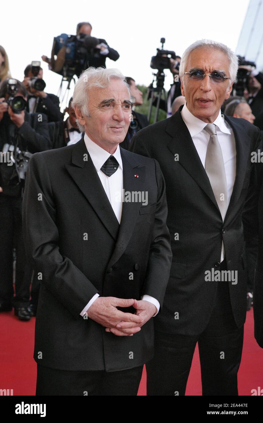 Charles Aznavour and Gerard Darmon arrive for the screening of the film 'Peindre ou faire l'amour' directed by Arnaud and Jean-Marie Larrieu during the 58th International Cannes Film Festival, in Cannes, southern France, on May 18, 2005. Photo by Hahn-Nebinger-Klein/ABACA. Stock Photo