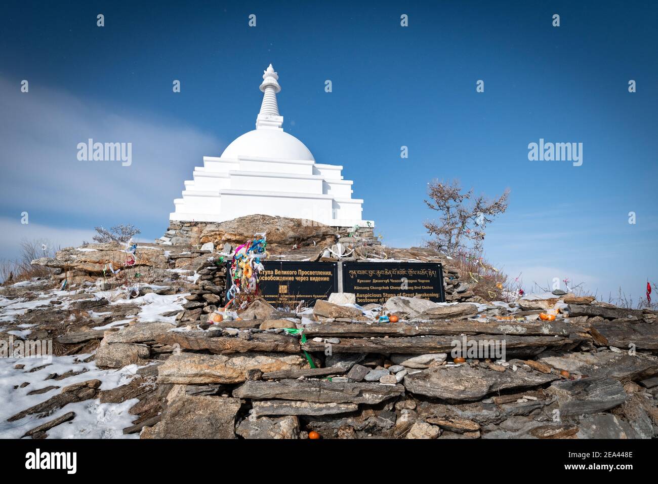 Febuary 28 2020 : Ogoy Island, Baikal Lake, Russia- White Buddhist stupa and the baikal lake Stock Photo