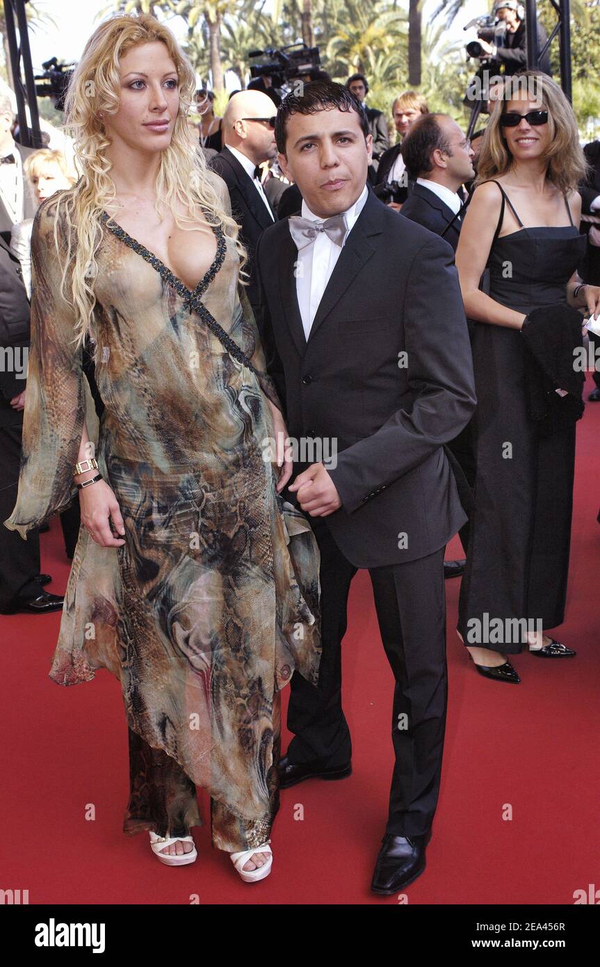 French reality TV star Loana Petrucciani and singer Faudel arrive for the screening of the film 'The Three Burials of Melquiades Estrada' directed by Tommy Lee Jones at the 58th International Cannes Film Festival, in Cannes, southern France, on May 20, 2005. Photo by Hahn-Nebinger-Klein/ABACA. Stock Photo