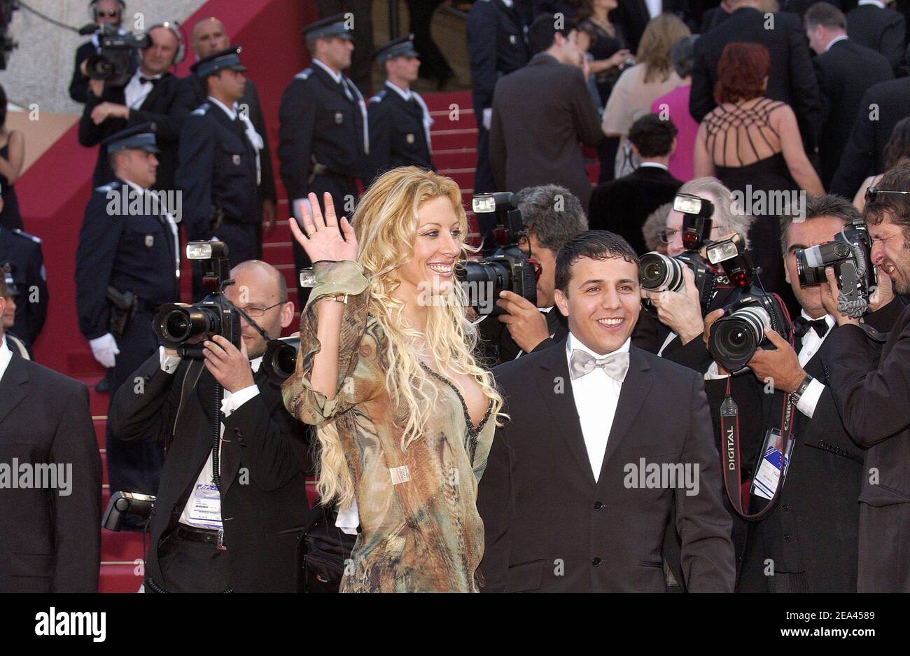 French reality TV star Loana Petrucciani and singer Faudel arrive for the screening of the film 'The Three Burials of Melquiades Estrada' directed by Tommy Lee Jones at the 58th International Cannes Film Festival, in Cannes, southern France, on May 20, 2005. Photo by Hahn-Nebinger-Klein/ABACA. Stock Photo