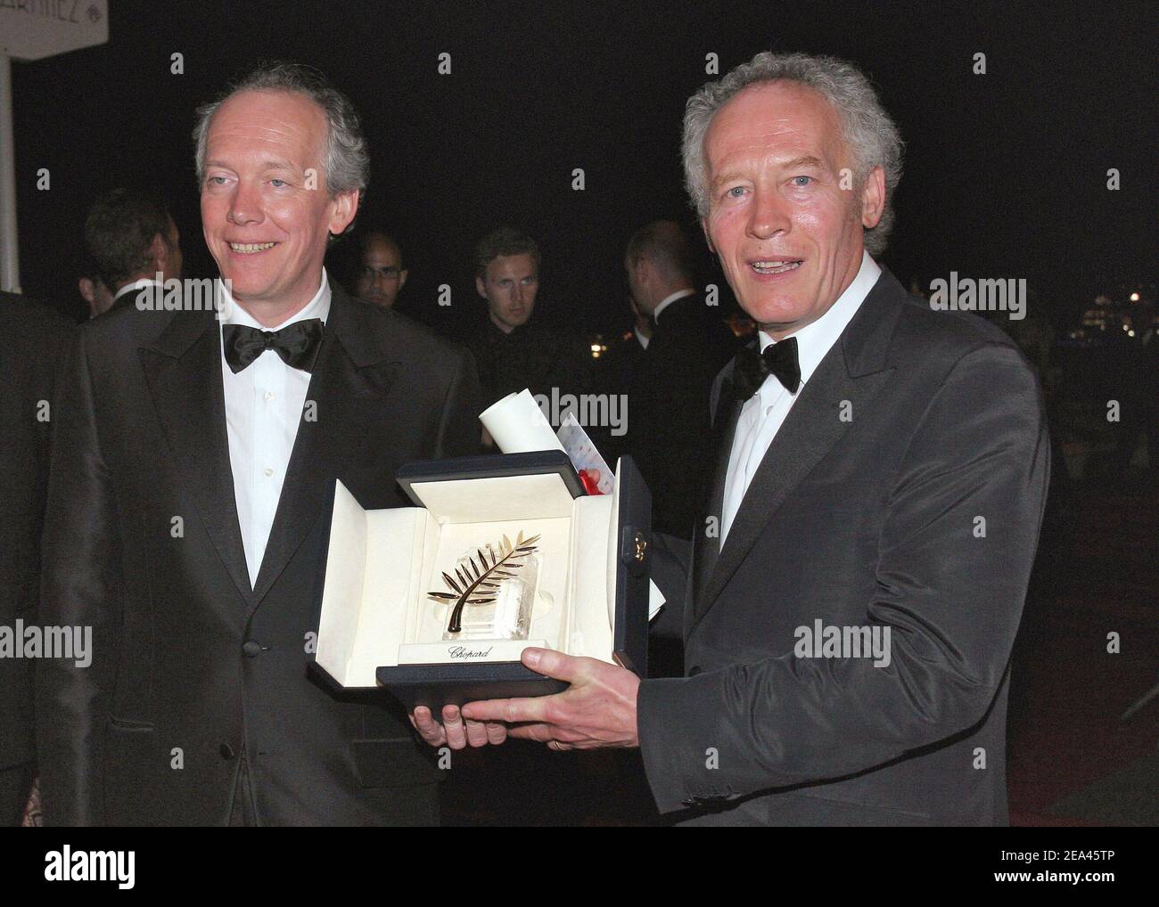 Palme d'Or winners Jean-Pierre and Luc Dardenne arrive to the 'Palmares Dinner' held at the Martinez Beach during the 58th International Cannes Film Festival, in Cannes, France on May 21, 2005. Photo by Benoit Pinguet/ABACA. Stock Photo