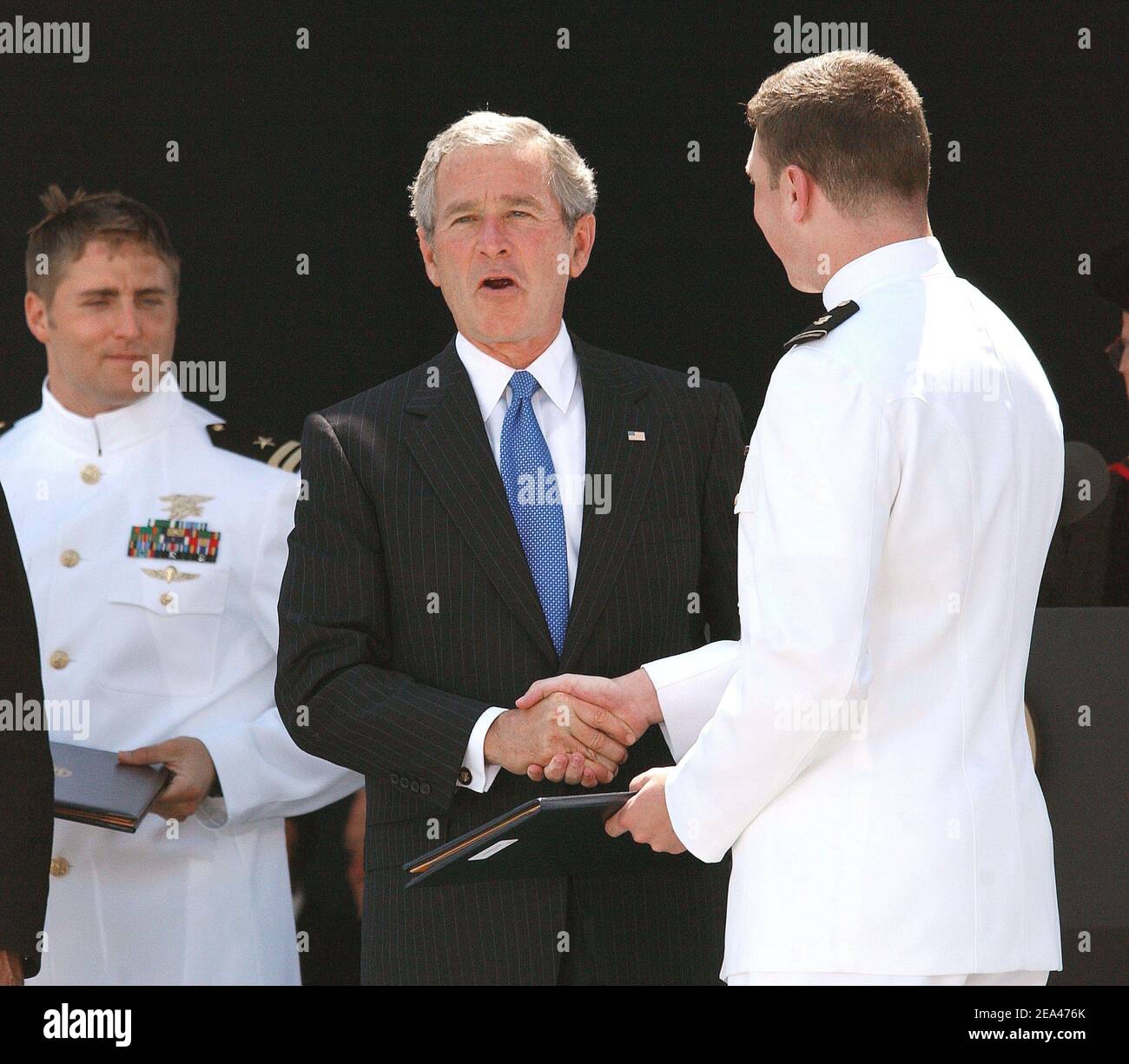 President George W. bush congratulates the U.S. Naval Academy Class of ...