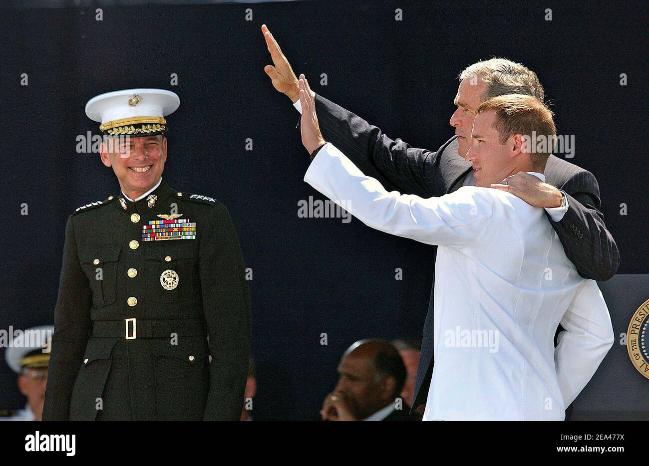 President George W. bush congratulates the U.S. Naval Academy Class of ...