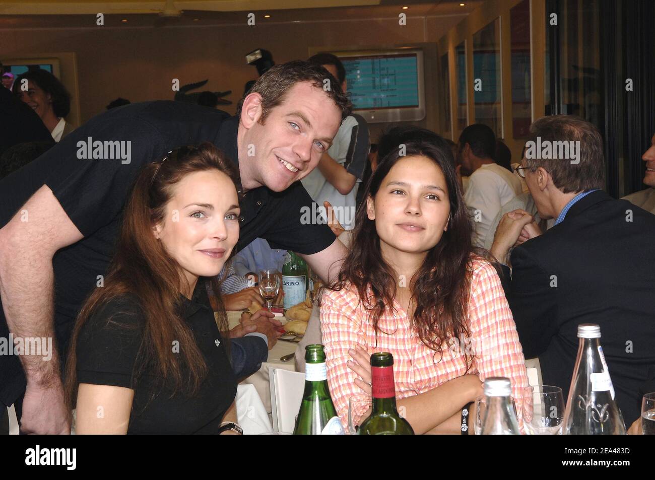 French singer Claire Keim, Canadian singer Garou and French actress Virginie Ledoyen pose while lunching at the Roland Garros 'VIP Village' during the 2005 French tennis Open at Roland Garros in Paris, France on May 31, 2005. Photo by Gorassini-Zabulon/ABACA. Stock Photo
