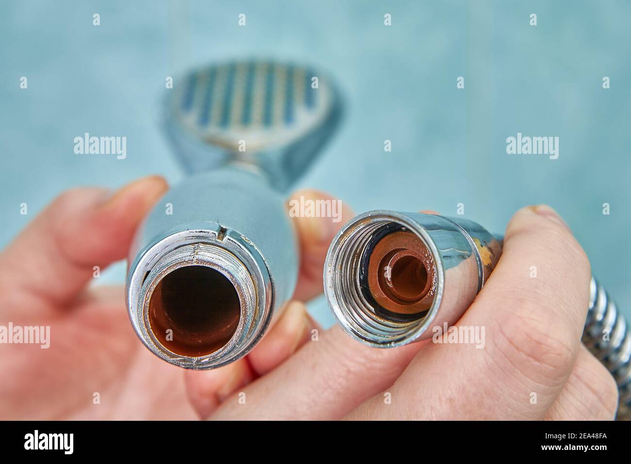 Rust inside old shower head being disassembled Stock Photo Alamy