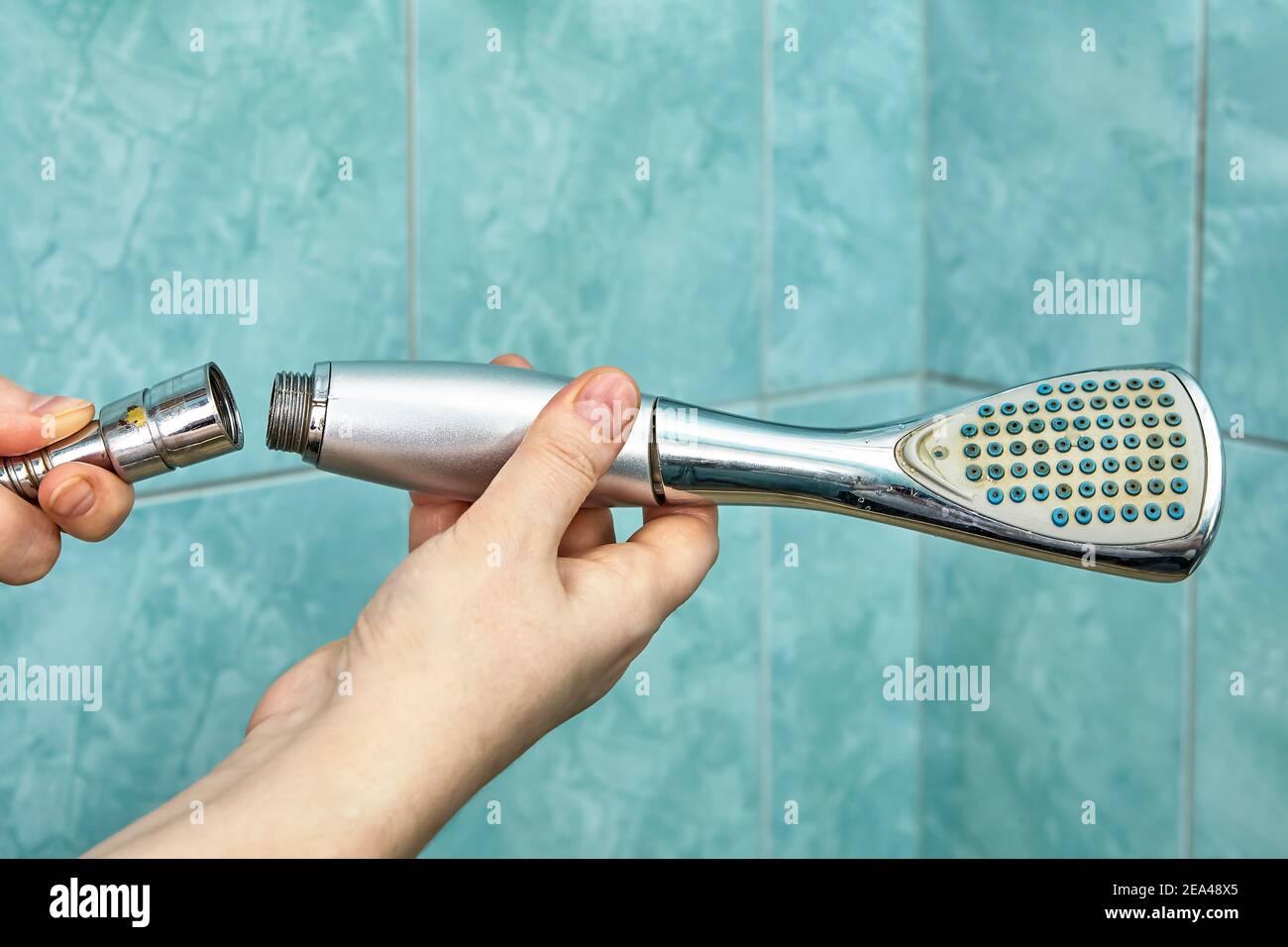 Removing old rusted shower head in bathroom Stock Photo Alamy