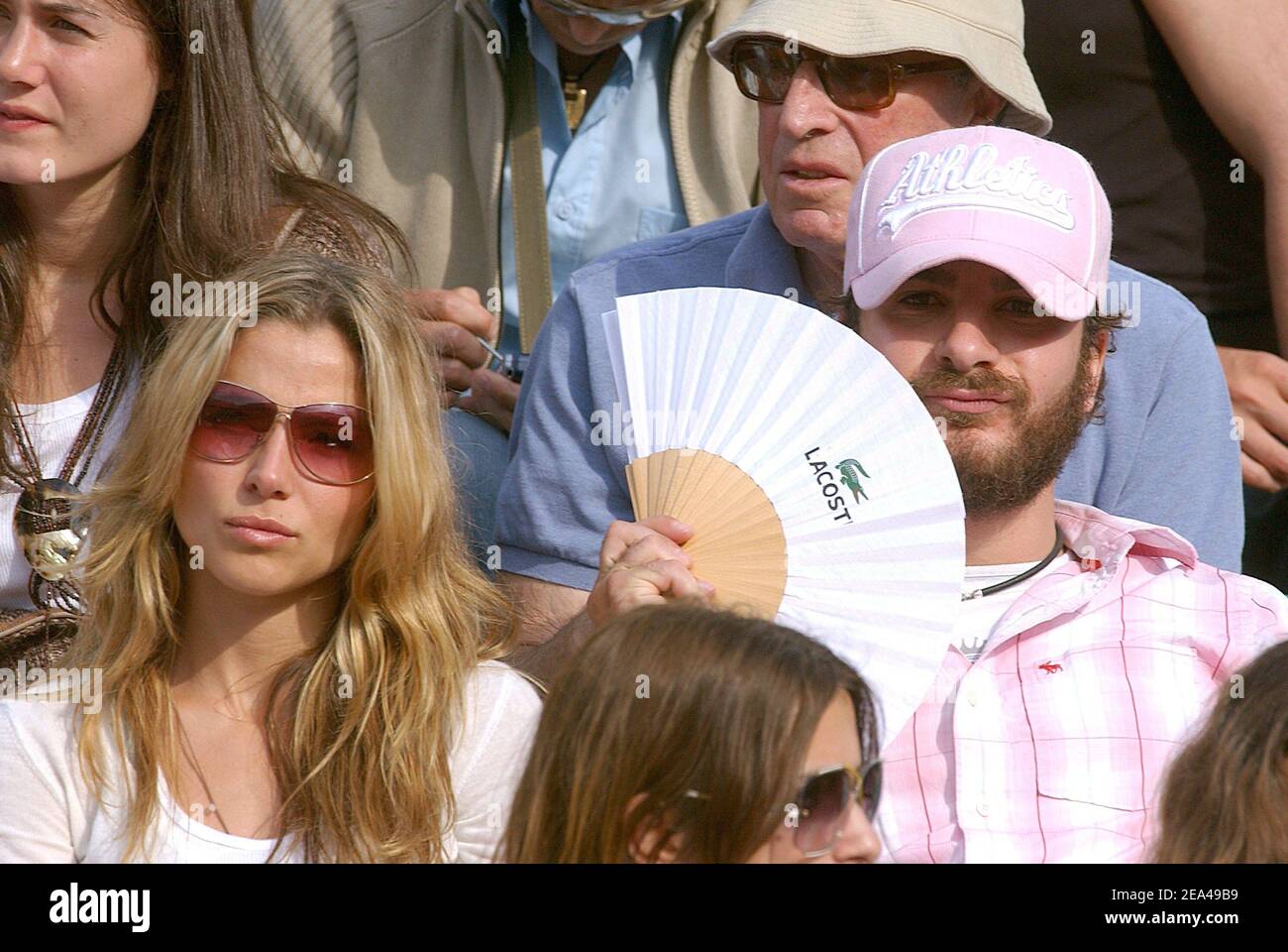 French actor Michael Youn and his girlfriend Spanish actress Elsa Pataky attend the match between Spain's Rafael Nadal and Swiss Roger Federer in the semi final of the French Open at the Roland Garros stadium in Paris, France on June 03, 2005. Michael Youn gains weight for his next movie. Photo by Gorassini-Zabulon/ABACA. Stock Photo